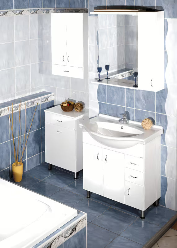 Bijela kopalniška omarica z umivalnikom Keramia Pro neutralnog dizajna, prikladna za većinu kupaonica.