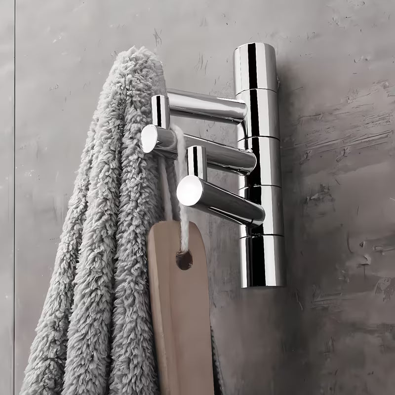 Kromirani trostruki vrtljiv kavelj Nimco Bormo za kupaonicu jednostavnog dizajna.