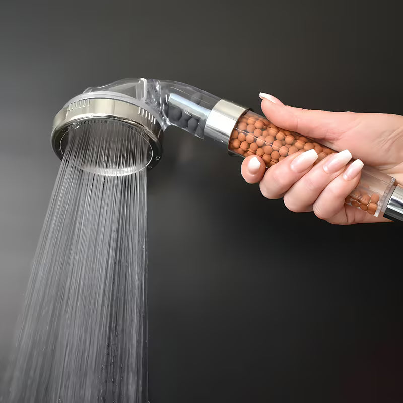 Prozirni ručni tuš ročka Rav Slezak s mikro mlaznicama i filtracijskim mineralnim kamenčićima, Ø 80 mm.