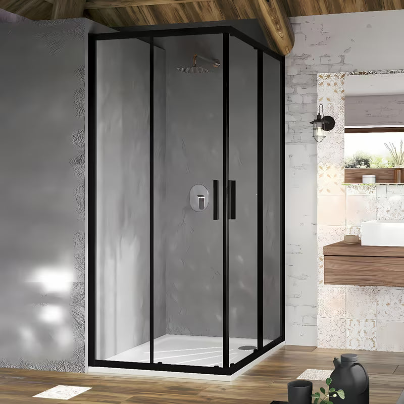 Kvadratni kotni tuš kabina Ravak Blix Slim 90x90 cm v črni barvi s prozornim steklom in drsnimi vrati.