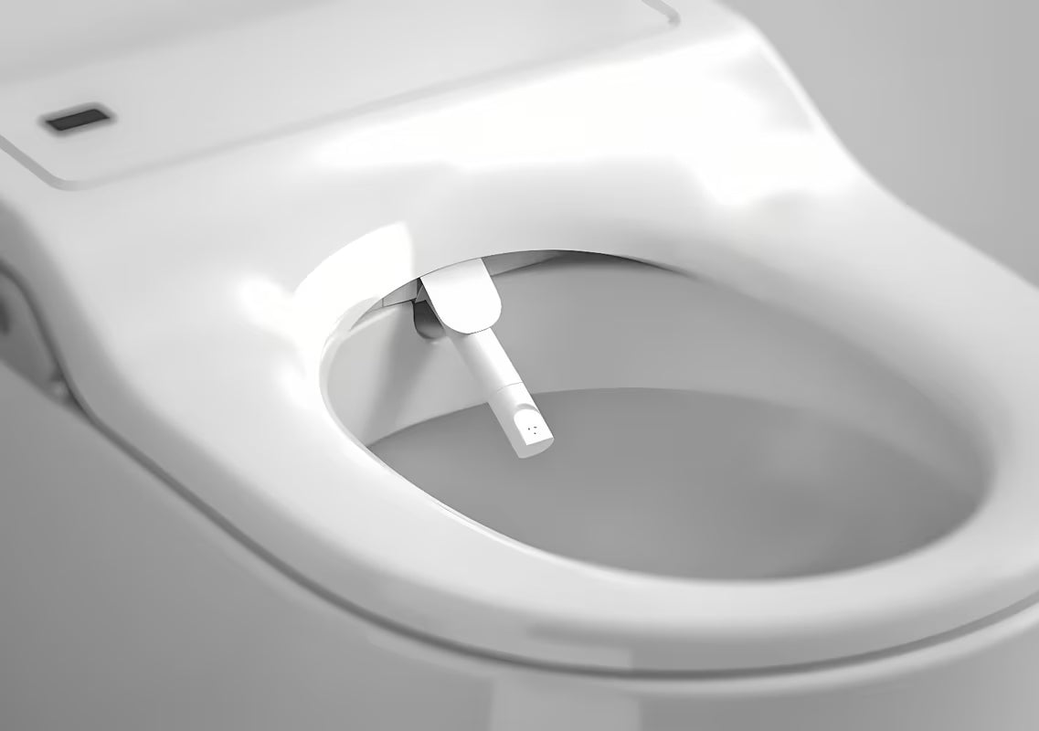 Viseča WC Školjka Roca Inspira In-Wash s integriranim bideom u bijeloj boji i Rimless izvedbi.