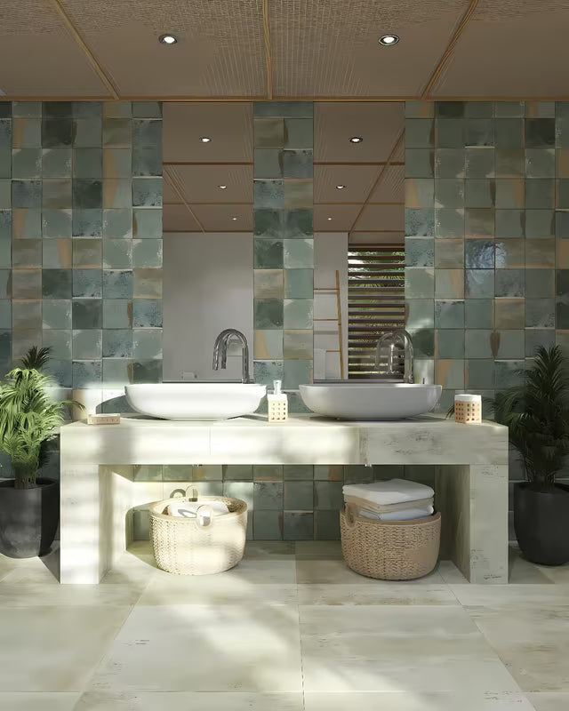 Sivi betonski umivalnik na ploščo SAT Cemento 65x35 cm zaobljenog oblika i tankih stijenki.