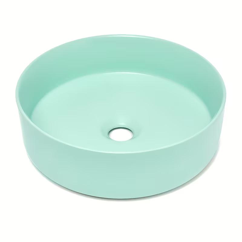 Okrugli keramički umivalnik na ploščo SAT Mood u mat mint boji brez odprtine za armaturo i brez preliva.