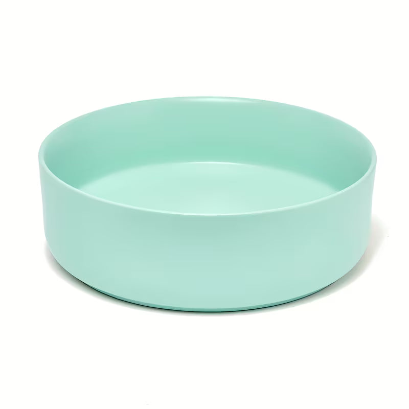 Okrugli keramički umivalnik na ploščo SAT Mood u mat mint boji brez odprtine za armaturo i brez preliva.