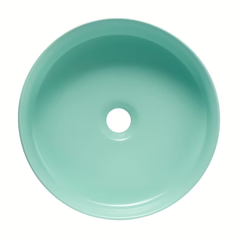 Okrugli keramički umivalnik na ploščo SAT Mood u mat mint boji brez odprtine za armaturo i brez preliva.