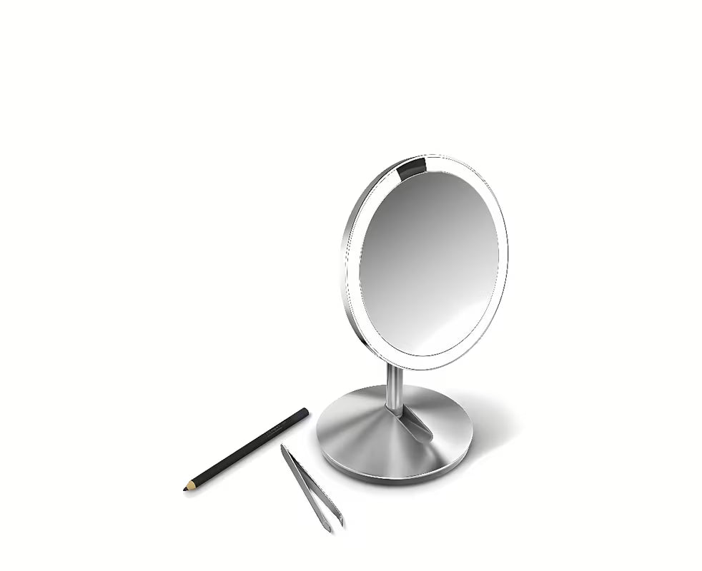 Potovalno kozmetično ogledalo Simplehuman Mini z osvetlitvijo Tru-lux Led in 10-kratno povečavo v krtačenem nerjavnem jeklu.