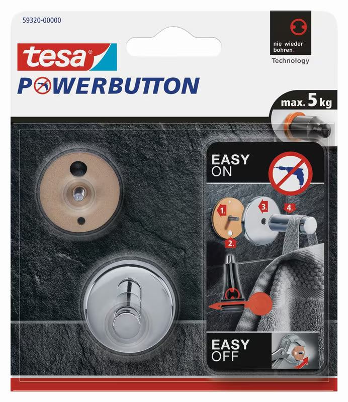Kromiran kavelj Tesa powerbutton pro montaža brez vrtanja na ploščice in druge gladke površine.