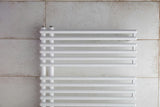 Bel kombiniran kopalniški radiator Anima Henrik 60x145 cm, primeren pro za ogrevanje in sušenje brisač.