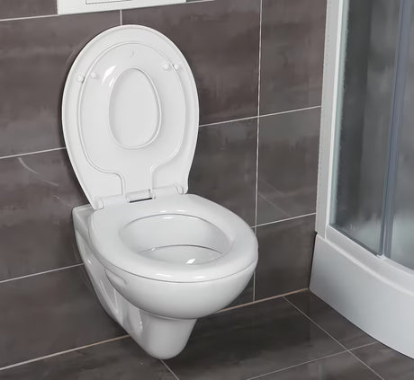 Bela otroška WC deska Glacera Babynew z integriranim vložkom in počasnim zapiranjem mehko Zapiranje Soft Close.