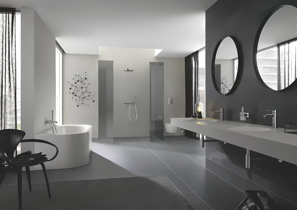 Umivalniška enoročna armatura Grohe Essence New z visokim izlivom in površino supersteel.