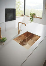Grohe Essence New armatura za pomivalno korito z visokim vrtljivim izlivom v barvi brushed warm sunset