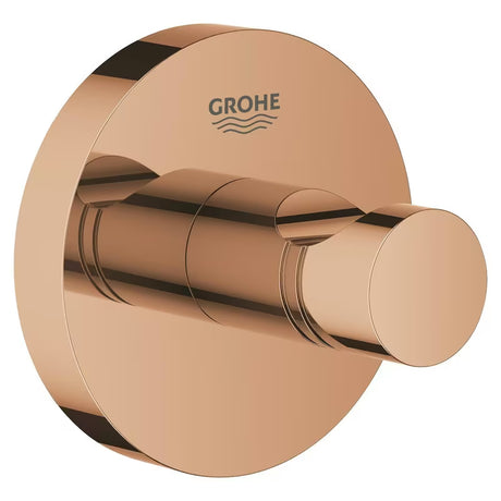 Kavelj za kopalni plašč Grohe Essentials v izvedbi warm sunset s skritim pritrjevanjem in površino Grohe StarLight.