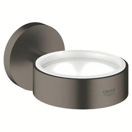 Držalo Grohe Essentials pro za milnik ali kozarec v izvedbi Brushed Hard Graphite s skritim pritrjevanjem.