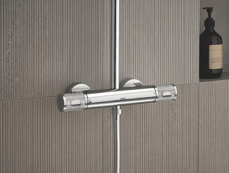 Krom tušni sistem Grohe Euphoria System s termostatsko armaturo z nadglavno in ročno prho