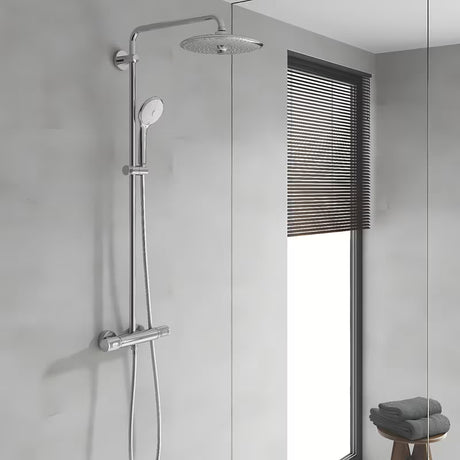 Tušni sistem Grohe Euphoria System s termostatsko armaturo v krom izvedbi z nadglavno in ročno prho