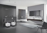 Kromirana enoročna armatura za umivalnik Grohe Eurocube s srednje visokim izlivom in odtočnim kompletom.