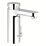 Kromirana samozapiralna armatura za umivalnik Grohe Eurosmart Cosmopolitan T s tehnologijo Grohe EcoJoy.
