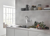 Grohe Eurosmart New enoročna stenska armatura za pomivalno korito v krom izvedbi z vrtljivim izlivom.