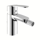 Kromirana armatura za bide Grohe Eurostyle Cosmopolitan z odtokom in ročnim upravljanjem.