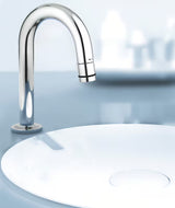 Kromiran ventil za umivalnik Grohe Universal z odtokom v obliki C in funkcijo start/stop