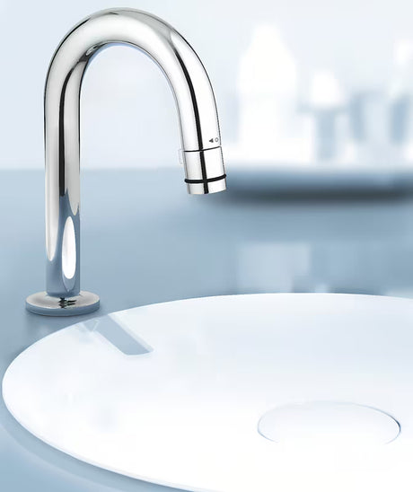 Kromiran ventil za umivalnik Grohe Universal z odtokom v obliki C in funkcijo start/stop