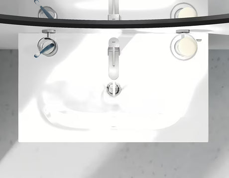 Umivalniška enoročna armatura Grohe Plus v izvedbi supersteel z vrtljivim izlivom in odtočnim kompletom.