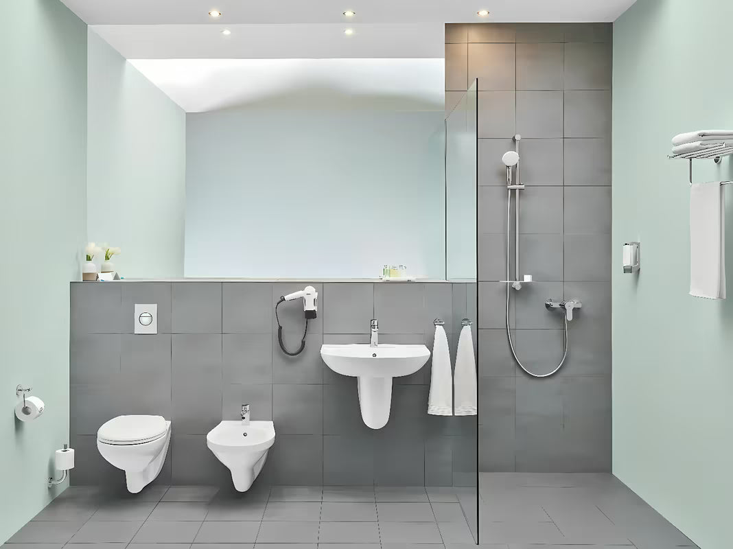 Kromirana enoročna armatura za umivalnik Grohe bauedge s pop-up odtokom