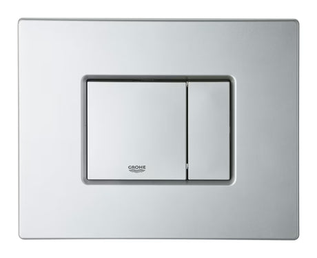 Splakovalna tipka Grohe Skate Cosmopolitan v izvedbi titanium/brilliant chrom s površino proti prstnim odtisom.