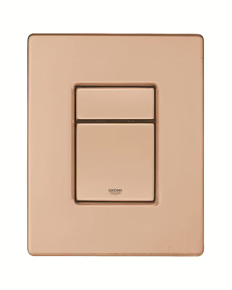Aktivirna tipka Grohe Skate Cosmopolitan v izvedbi brushed warm sunset pro podometni splakovalniki