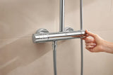 Tušni sistem Grohe Tempesta Cube System s termostatsko armaturo v krom izvedbi z nadglavno in ročno prho