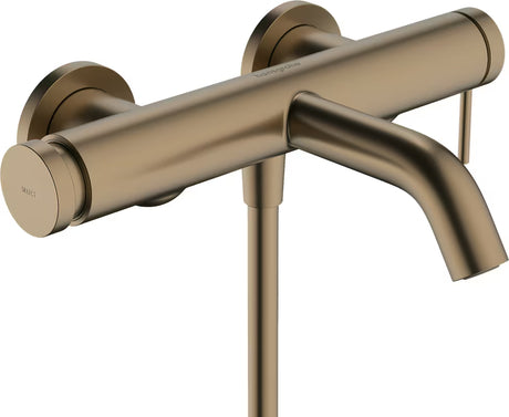 Stenska enoročna armatura za kad hansgrohe Tecturis S v brušeni bron izvedbi z gumbom Select.