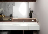 Kromirana enoročna armatura za umivalnik Hansgrohe Vernis Blend 100 z odtokom in potezno palico.
