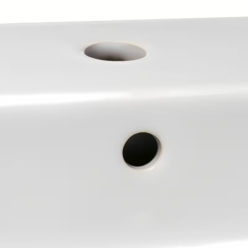 Bel keramični viseči umivalnik Ideal Standard Strada 60x42 cm z odprtino pro za armaturo na sredini