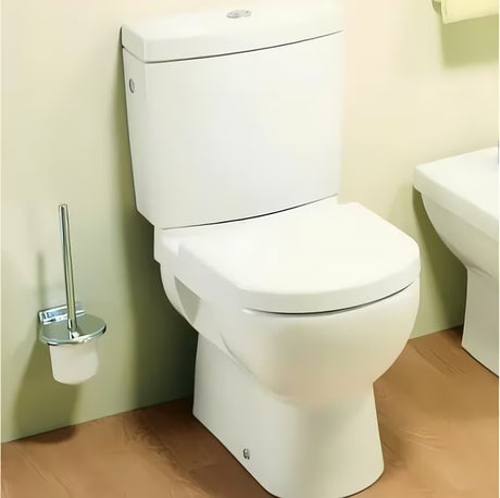 Bela WC školjka WC školjka kombi Jika Mio z globokim izpiranjem in odtokom Vario, brez kotlička in sedeža.