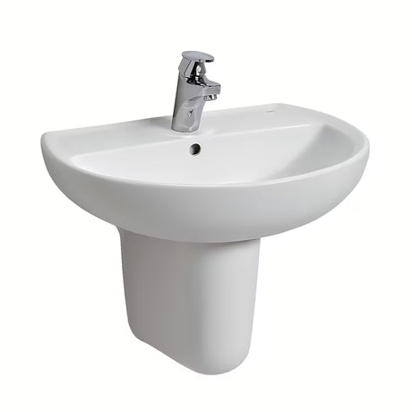 Bijeli viseče keramički umivaonik Kolo Rekord ovalnog oblika s otvorom za pro slavinu u sredini.