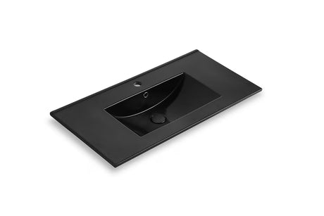 Crni keramički pohištveni umivalnik Naturel Modena 81 x 46 cm s otvorom za bateriju u sredini.