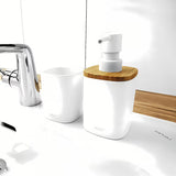 Bijeli samostoječi  držalo za zobne ščetke Nimco Badu od polirezina (tvrda plastika).