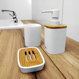 Bijeli samostoječi  držalo za zobne ščetke Nimco Badu od polirezina (tvrda plastika).