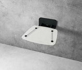 Zložljivo sedež za tuš Ravak Ovo B II s crnom konstrukcijom i prozirnim sjedalom Clear u četvrtastoj izvedbi.