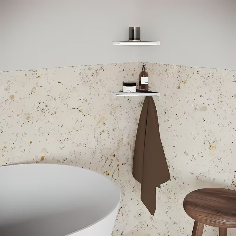 Kotna polica Ravak Slim C u izvedbi satin/krom s perforiranom površinom i donjim kukicama