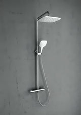 Tušni sistem Ravak Termo 300 s termostatsko armaturo v krom izvedbi z nadglavno prho 25 cm in ročno prho