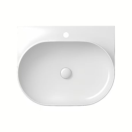 Vgradno keramički umivaonik Ravak Yard bijeli, ovalnog oblika i s uvučenom odlagališnom plohom.