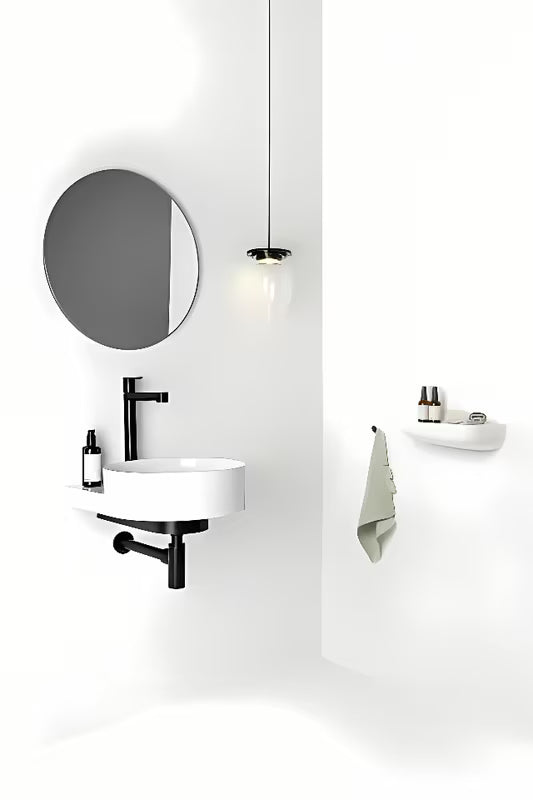 Bijeli keramički viseči umivalnik Ravak Yard 40 brez preliva s otvorom pro za stojeću slavinu.