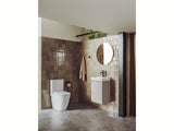 Bel stoječa WC školjka kombi Roca Ona brez splakovalnega kroga z vario odtokom in tehnologijo Roca Rimless®.