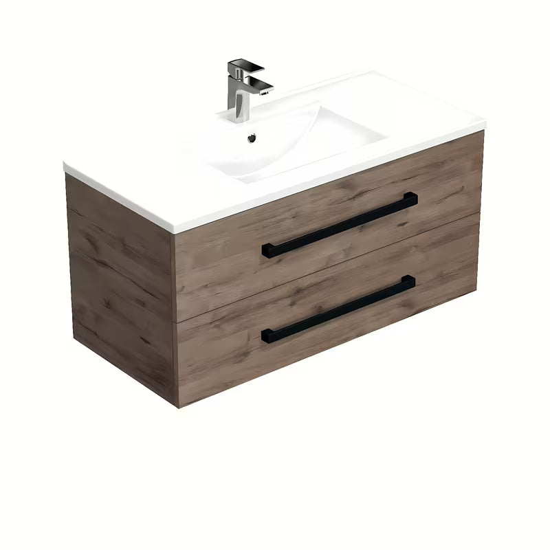 Viseča kopalniška omarica SAT Cube Way s keramičkim umivaonikom u dekoru hrasta Wellington i crnim ručkicama.