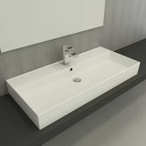 Beli keramični umivalnik SAT Infinitio 100,4x46,5 cm s prelivom in pravokotno obliko