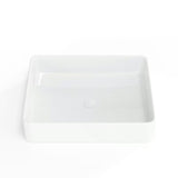 Sjajno bijeli keramički umivalnik na ploščo SAT Infinitio 50x40 cm brez preliva.