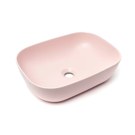 Mat ružičasti keramički umivalnik na ploščo SAT Infinitio brez preliva, ovalni oblik, 45,5x32,5 cm.