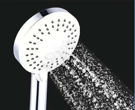 Bijela ručna tuš slušalica SIKO okruglog dizajna, promjera 12 cm, sa samočistećim mlaznicama