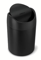 Črn namizni koš za smeti Simplehuman Mini s preklopnim pokrovom in prostornino 1,5 l.